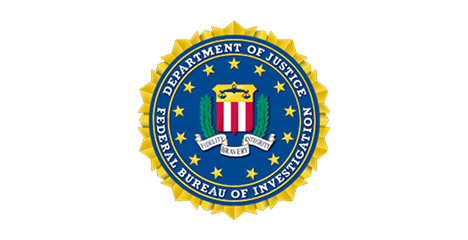 FBI logo with shield and laurel leaves.